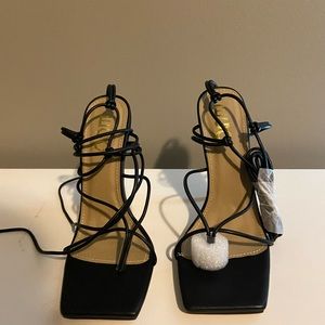 Black strap sandal heels